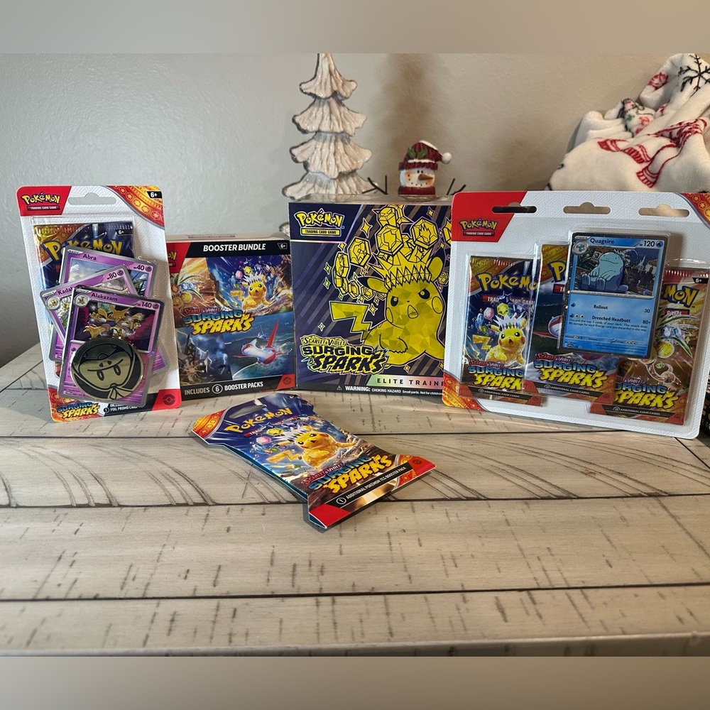 Pokémon TCG Surging Sparks Bundle- Includes everything pictured. factory sealed